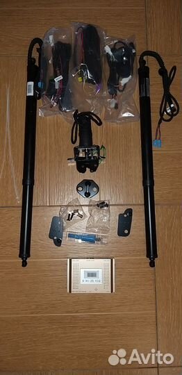 Замок двери багажника Voxy/Noah (электропривод)