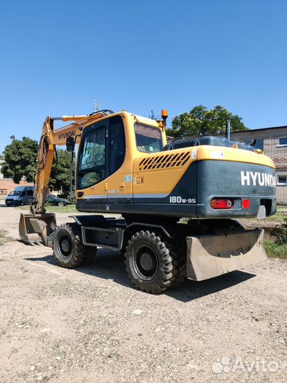 Колёсный экскаватор Hyundai R180W-9S, 2014