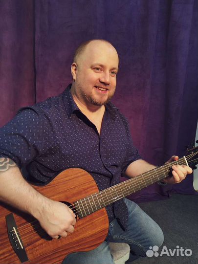 Репетитор по игре на гитаре