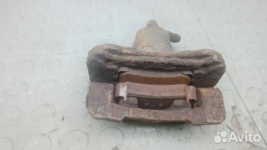 Суппорт тормозной задний правый KIA sportage 3 (SNK25OP01)