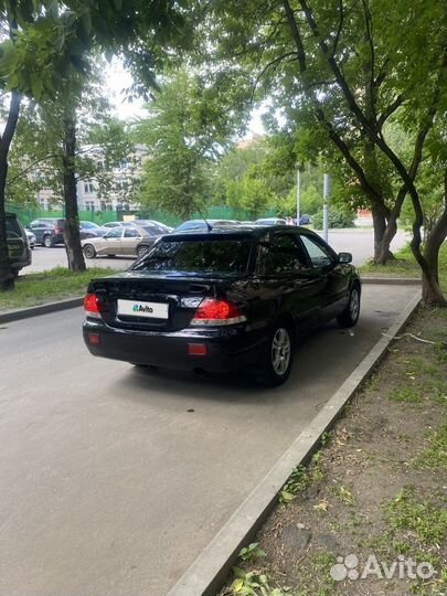 Mitsubishi Lancer 1.6 МТ, 2009, 172 450 км