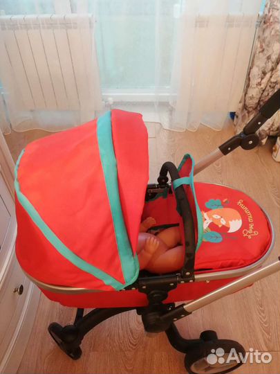 Игрушечная коляска