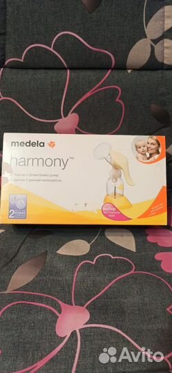 Молокоотсос medela ручной
