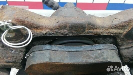 Суппорт тормозной передний левый opel astra G (ISE