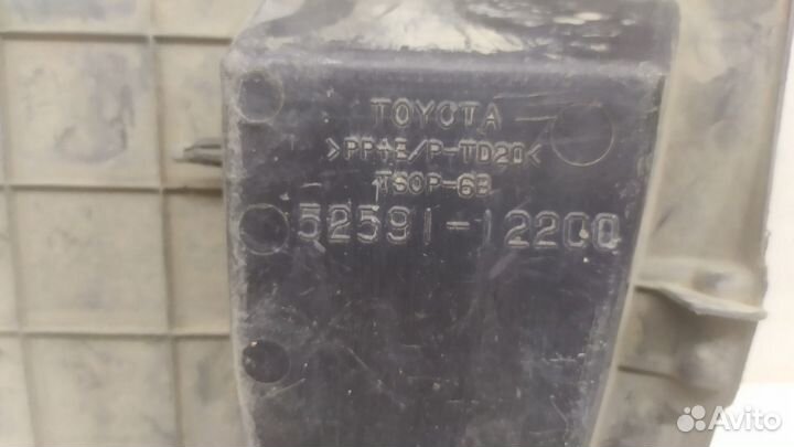 Пыльник бампера задний правый Toyota Corolla E150