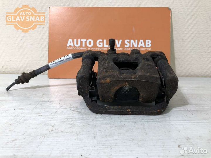 Суппорт задний левый Nissan Juke