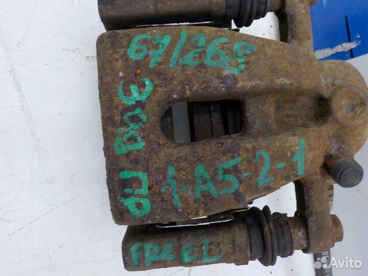 Суппорт тормозной задний правый Land Rover Freelan