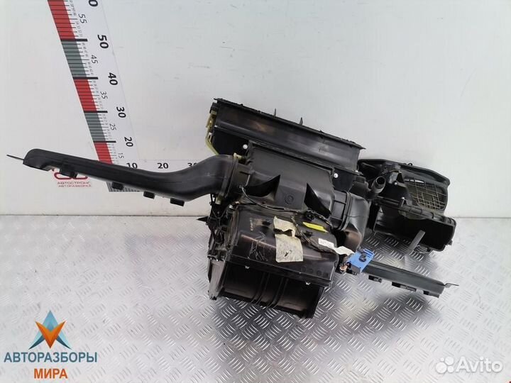 Отопитель в сборе (печка) Opel Astra 13227511