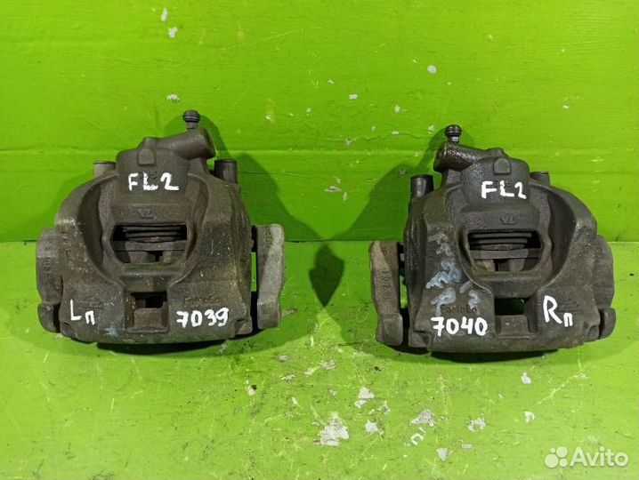 Суппорт тормозной передний Land Rover Freelander 2