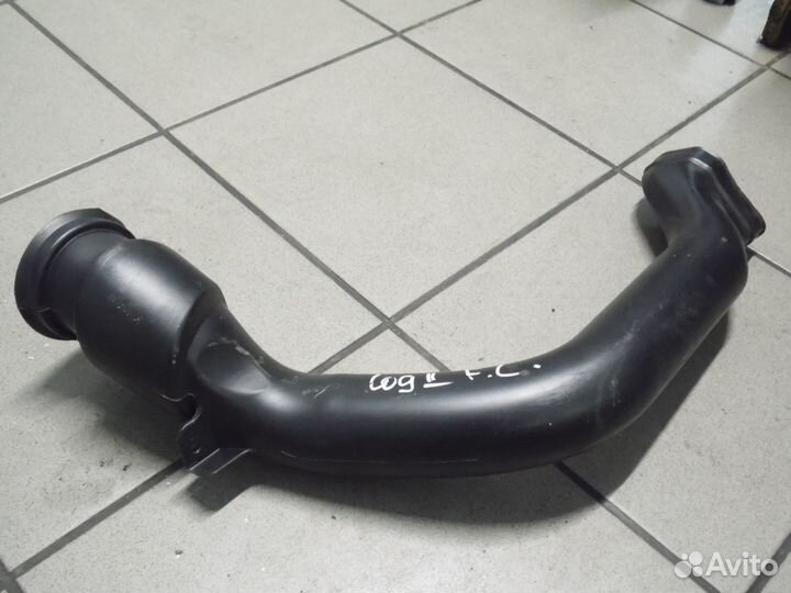 Патрубок воздуховода печки левый Рено Логан 2