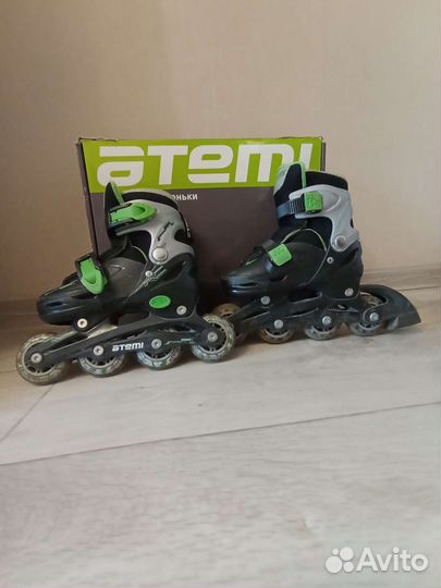 Роликовые коньки