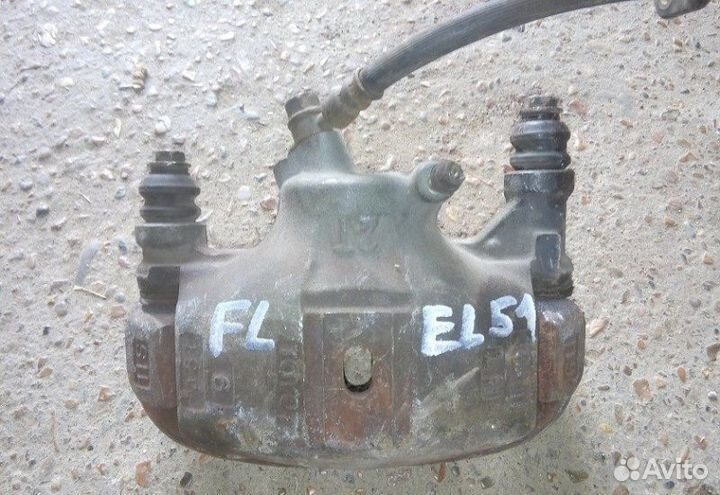 Передний левый суппорт Toyota Tercel EL51 4E FE