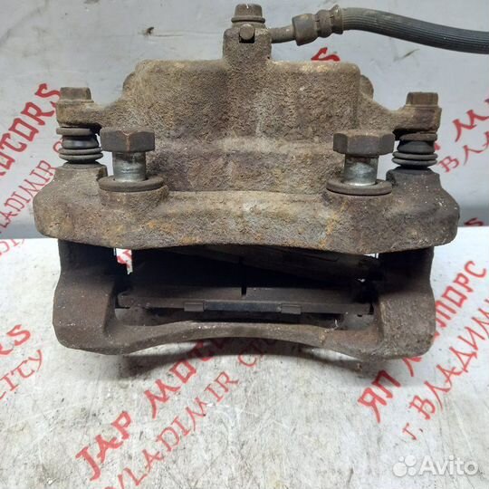 Суппорт тормозной передний правый Nissan X Trail