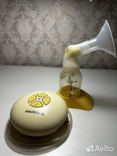 Молокоотсос medela swing