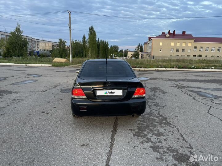 Mitsubishi Lancer 1.6 AT, 2009, 246 000 км