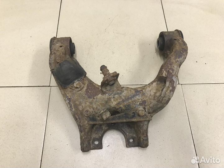 Рычаг передний верхний левый L200 (KB) 2006-2016