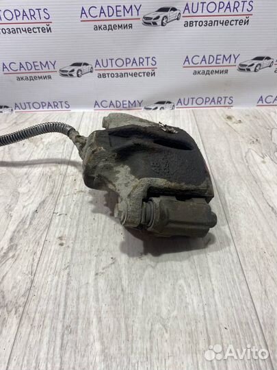 Суппорт тормозной передний левый Peugeot 206