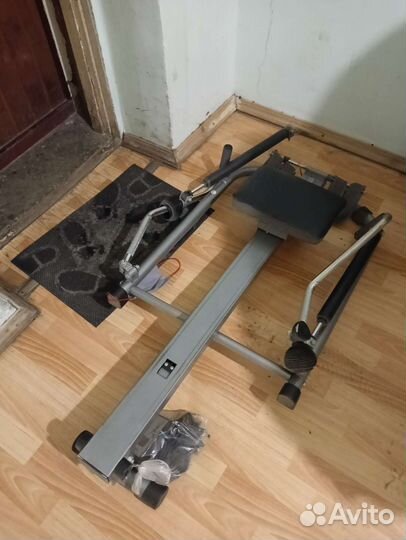 Гребной тренажер