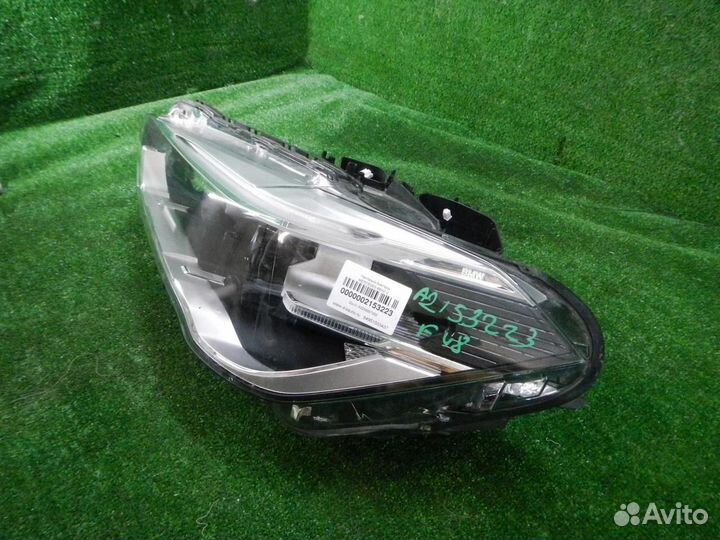 Фара левая BMW X1
