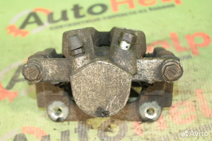 Суппорт toyota avensis AZT250 задний левый