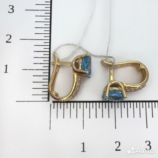 Золотые серьги с камнем