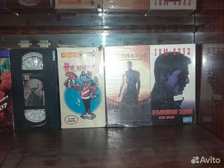 Видео кассеты с фильмами и мультфильмами