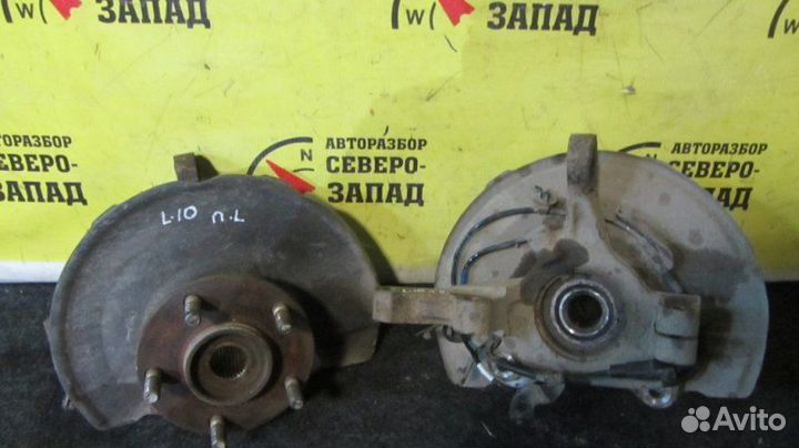 Кулак поворотный передний левый Mitsubishi Lancer