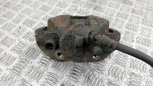 Суппорт тормозной передний правый mazda 3 1 (89G16