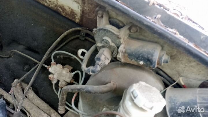 Моторчик стеклоочистителя передний Kia Rio 1