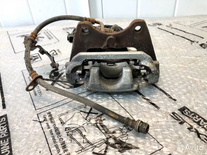 Суппорт тормозной задний левый Lexus Rx 4