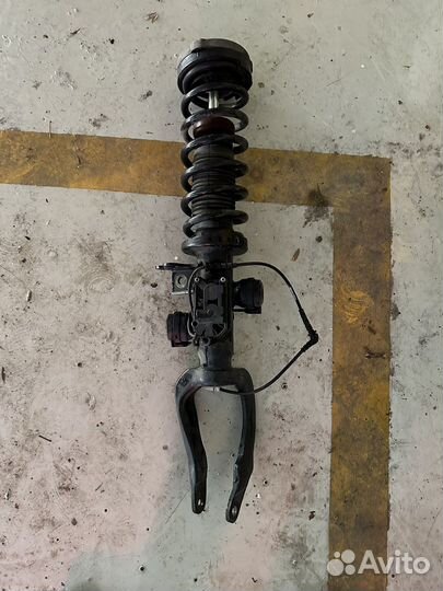 Стойка амортизатора левая BMW f01 f02