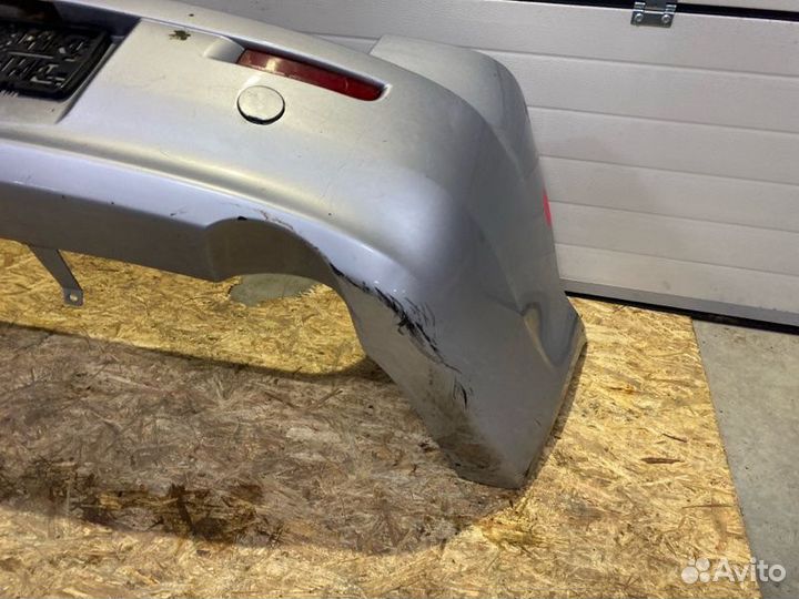 Бампер задний Mitsubishi Lancer