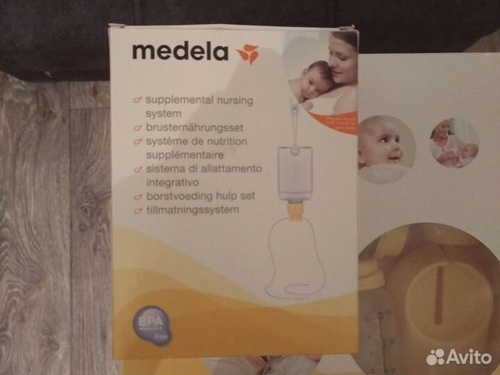 Молокоотсос medela электронный