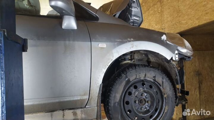 Стеклоподъемник эл.передний правый Nissan Tiida