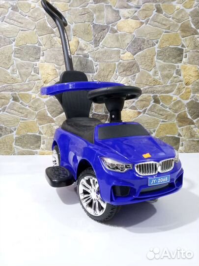 Детская машинка каталка с ручкой