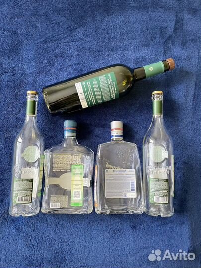 Бутылки с крышками от виски, коньяка, водки, вина