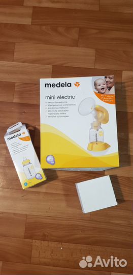 Молокоотсос medela электрический