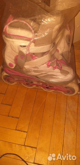 Роликовые коньки