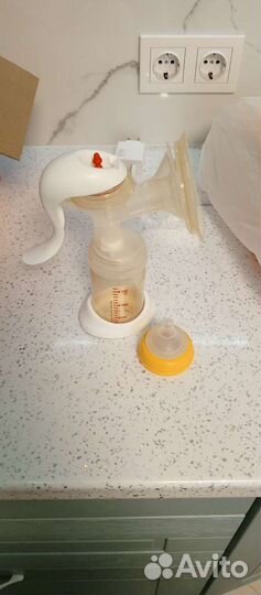 Молокоотсос medela swing электрический