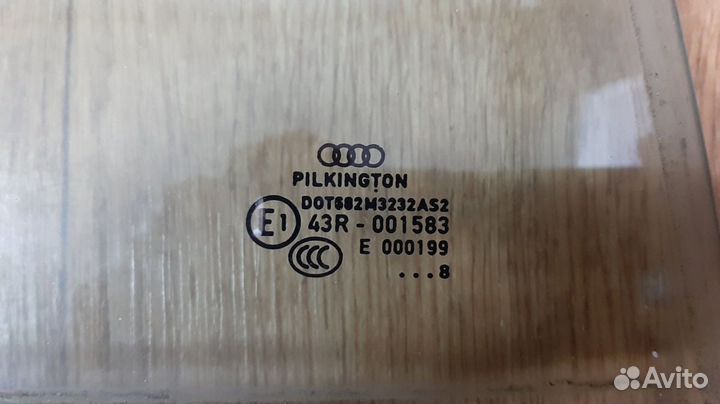 Стекло двери задней Audi A4