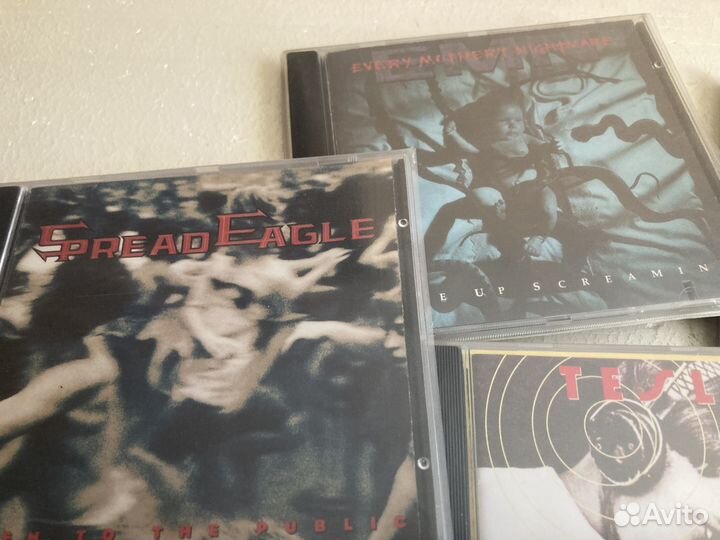 Компакт диски фирма(Tesla-Spread Eagle-Dokken)