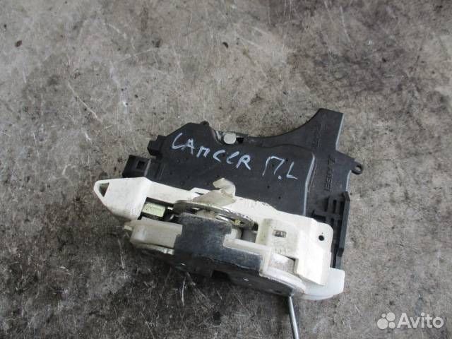 Замок двери передней левой Mitsubishi Lancer 9