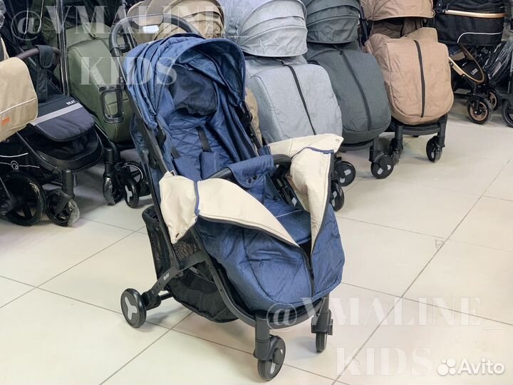 Детская прогулочная коляска с механической спинкой
