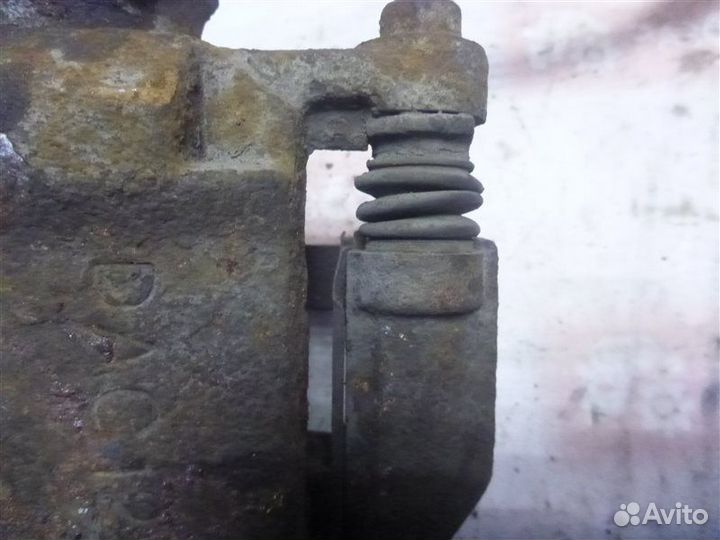 Суппорт передний левый Chevrolet Lacetti J200