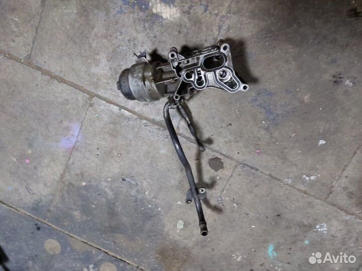 Корпус масляного фильтра Opel Combo Z13DTJ