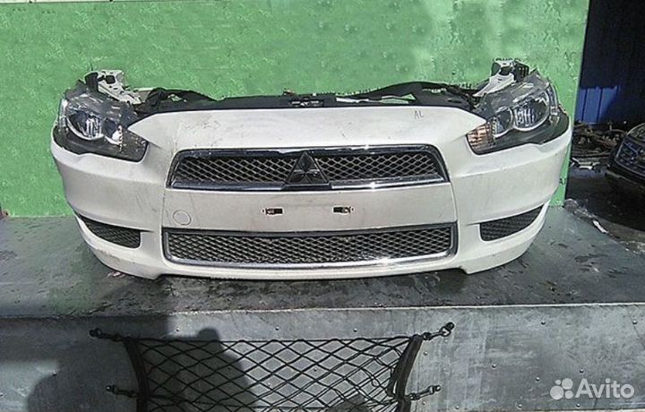 Бампер крыло капот фара на mitsubishi lancer 10