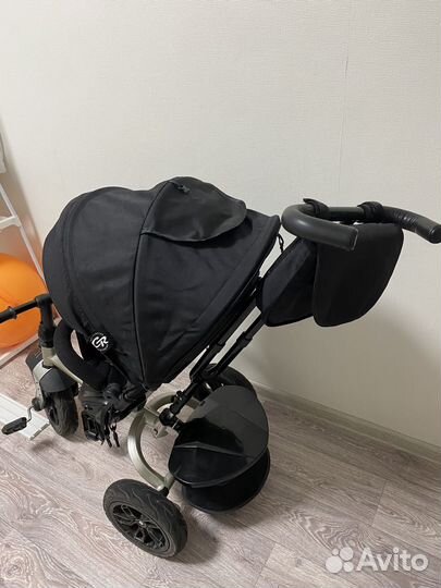 Прогулочная коляска велосипед