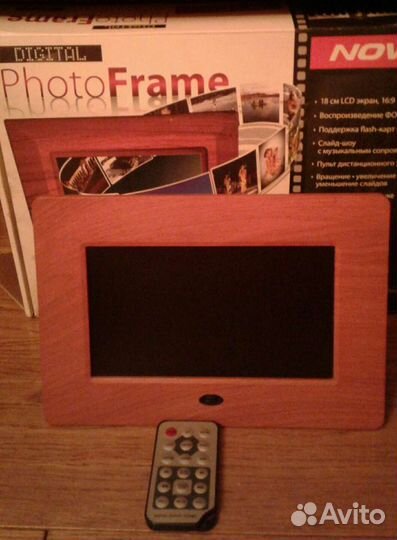 Рабочая фоторамка+видео+аудио novex NPF-701