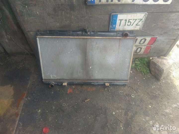 Ниссан примера р11 радиатор