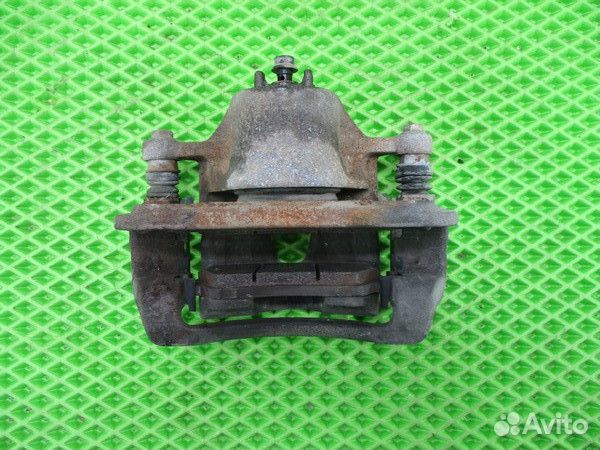 Суппорт передний левый Kia Rio 3 (UB\QB)